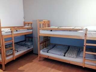 Хостелы Hostel Orange Торунь Кровать в общем 12-местном номере-8
