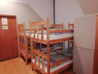 Хостелы Hostel Orange Торунь Кровать в общем 12-местном номере-9